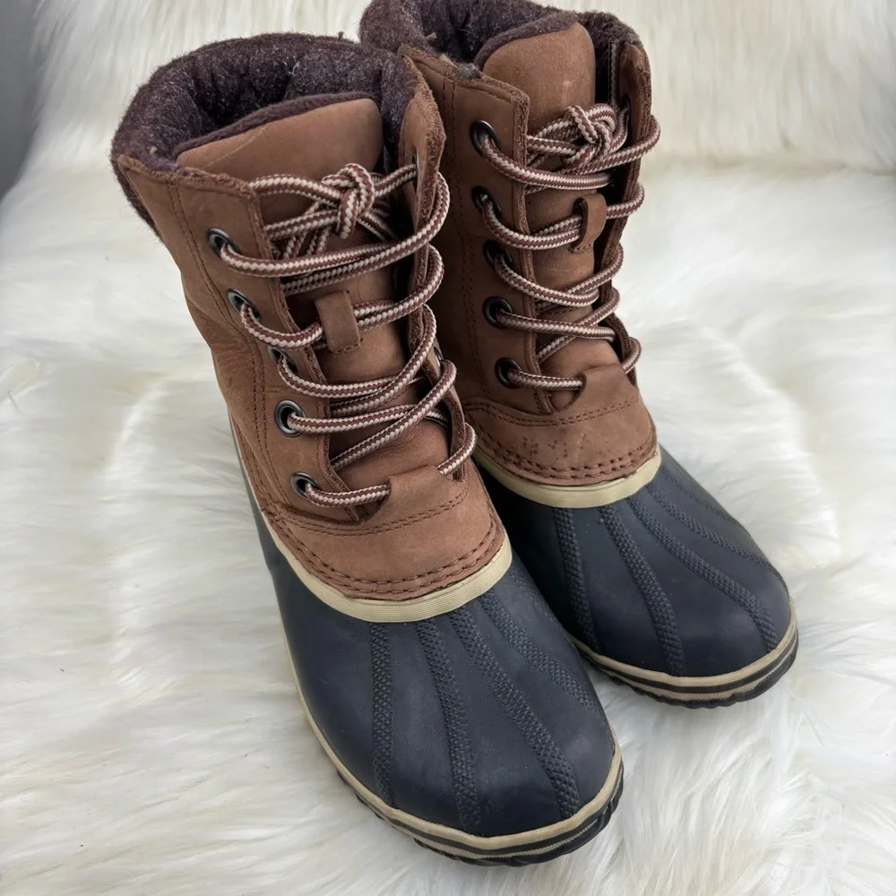 Sorel Tan and Black Lace-Up Boots
